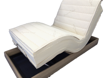 The Essential 7-inch Orthopedic Firm back pain mattress on an adjustable bed